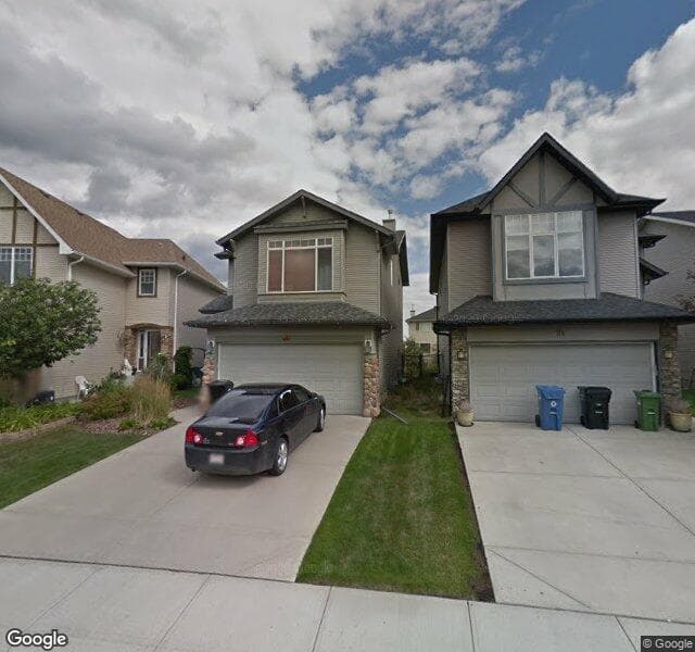 Street view of 20 Cougarstone Square SW, Calgary