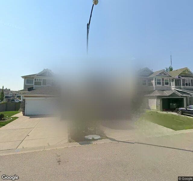 Street view of 149 Cougar Plateau Mews SW, Calgary
