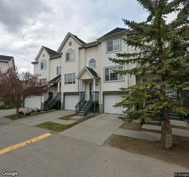 Street view of 32-49 Rocky Ridge Gate NW, Calgary
