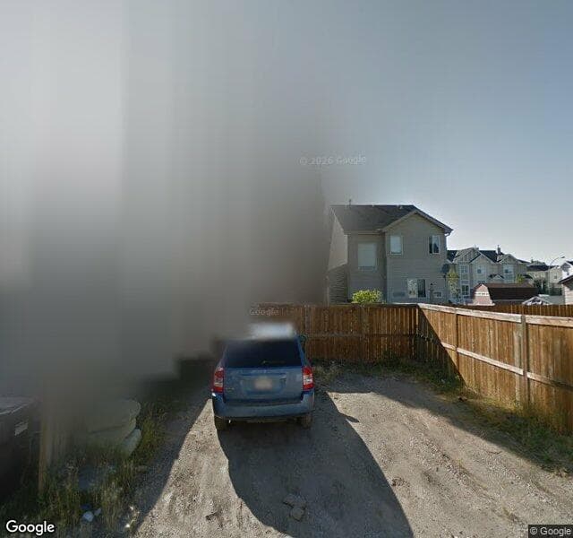 Street view of 1008 New Brighton Gardens SE, Calgary