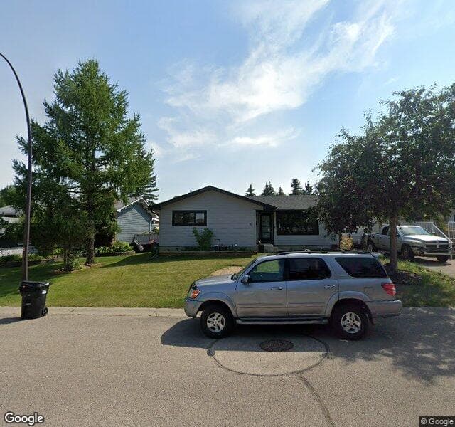 Street view of 15 Brookmere Place SW, Calgary