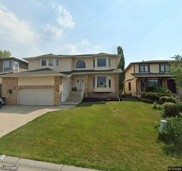 Street view of 248 Woodbriar Circle SW, Calgary