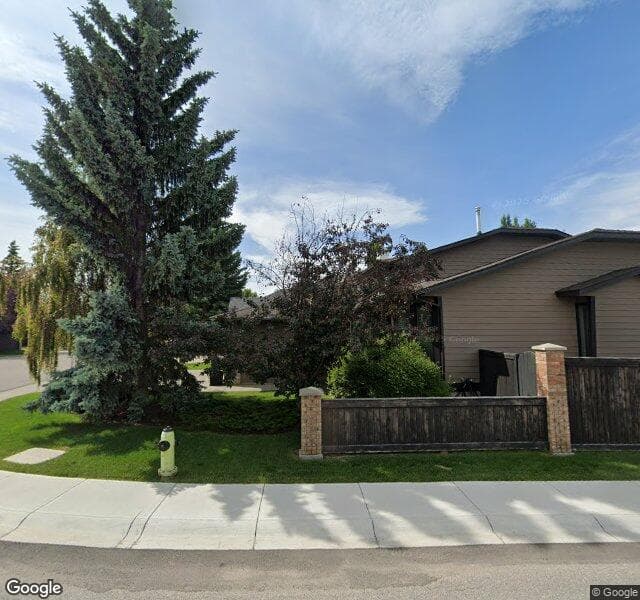 Street view of 122 Sunvista Crescent SE, Calgary