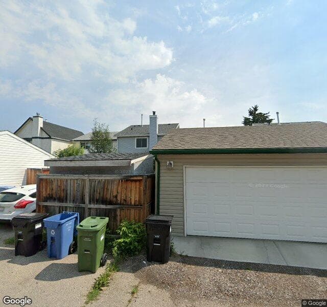 Street view of 23 Woodmont Green SW, Calgary
