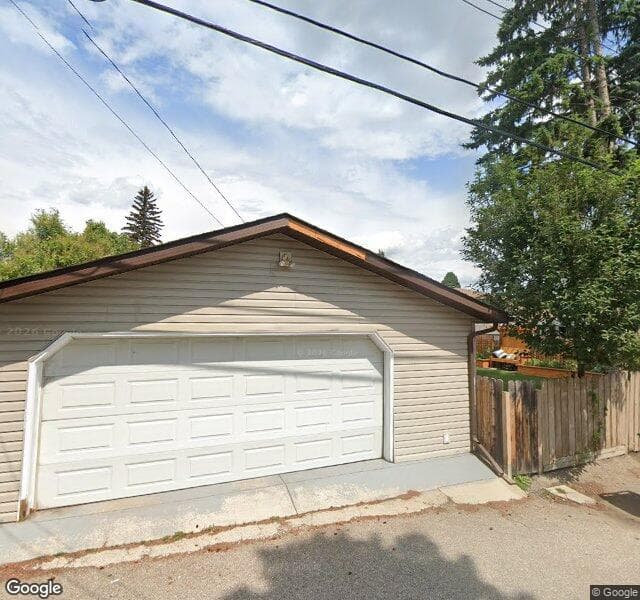 Street view of 1542 Lake Bonavista Drive SE, Calgary