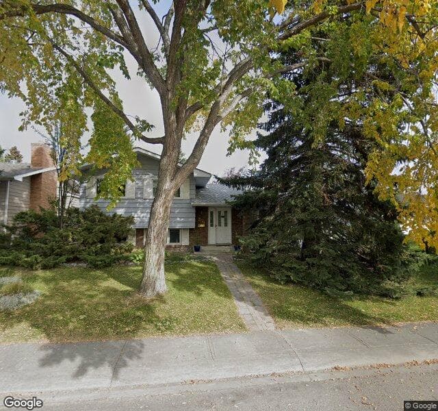 Street view of 256 Lake Lucerne Way SE, Calgary