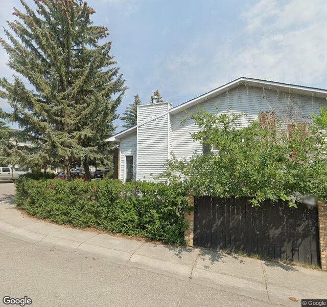 Street view of 36 Woodfern Way SW, Calgary