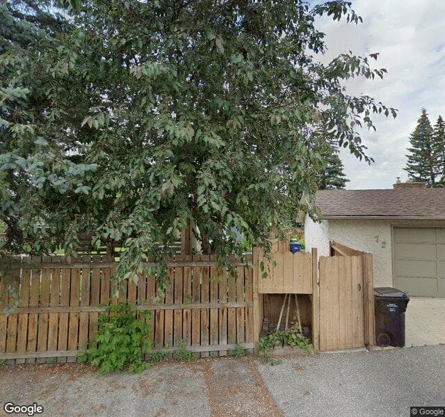 Street view of 76 Lake Crimson Close SE, Calgary