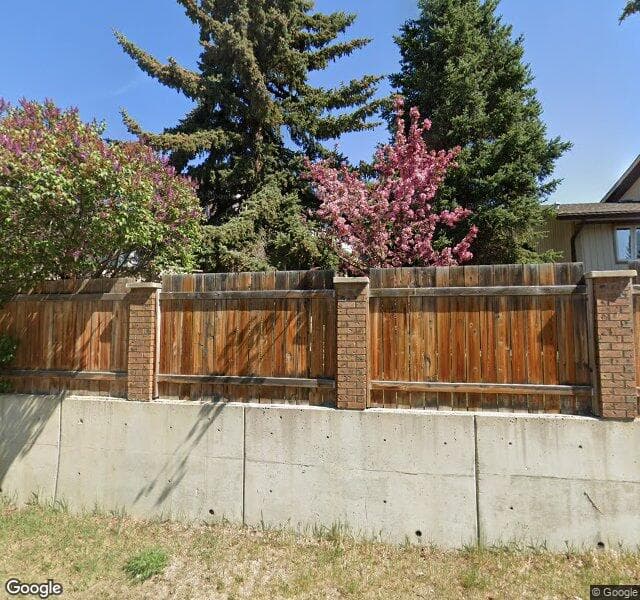 Street view of 323 Coach Ridge Rise SW, Calgary