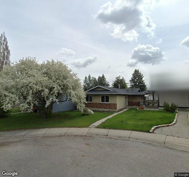 Street view of 72 Midlawn Place SE, Calgary