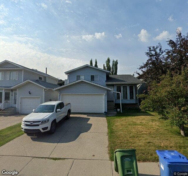 Street view of 60 Woodstock Way SW, Calgary