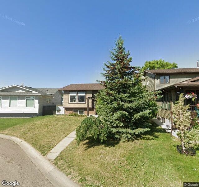 Street view of 23 Mchugh Place NE, Calgary