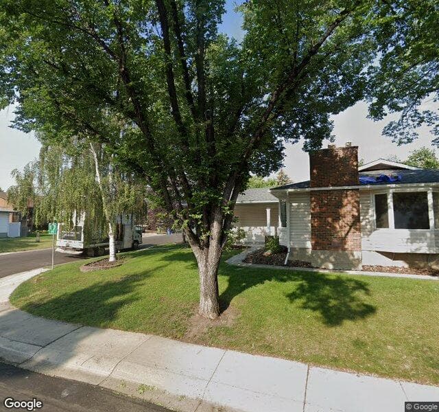 Street view of 103 Woodpark Place SW, Calgary