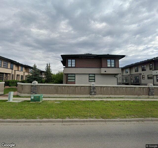 Street view of 217 Aspen Hills Villas SW, Calgary