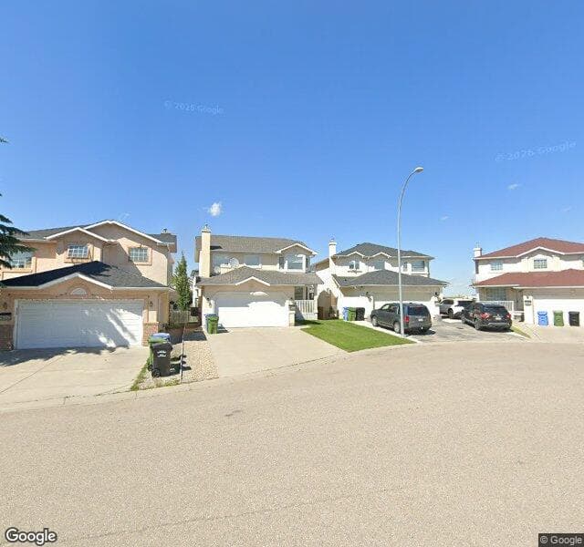Street view of 214 Coral Springs Place NE, Calgary