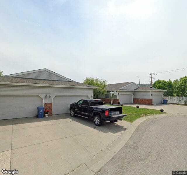 Street view of 28 Bow Landing NW, Calgary