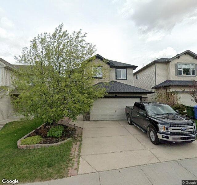 Street view of 18 Rockyspring Hill NW, Calgary