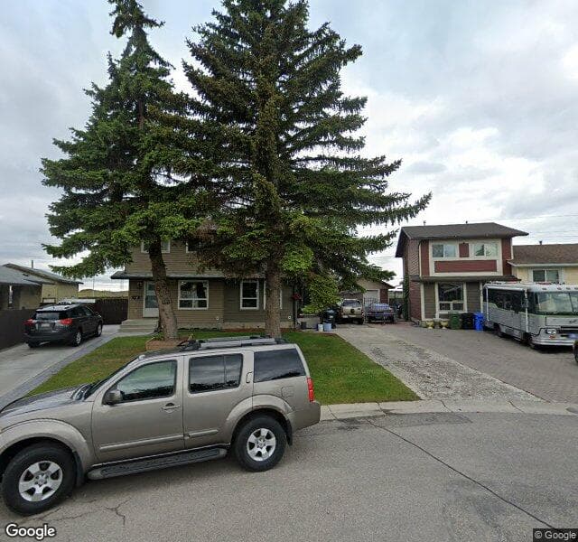 Street view of 128 Doverglen Crescent SE, Calgary