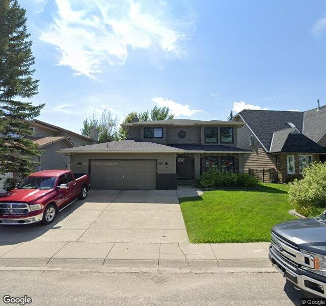 Street view of 90 Sunset Way SE, Calgary