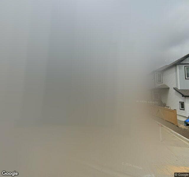 Street view of 87 Versant View SW, Calgary