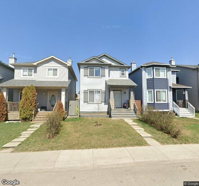 Street view of 74 Saddlecrest Place NE, Calgary