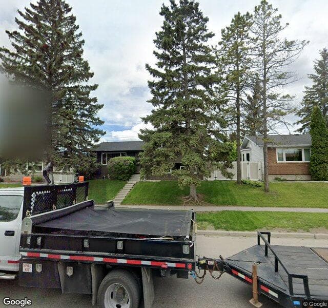 Street view of 511 Queensland Drive SE, Calgary