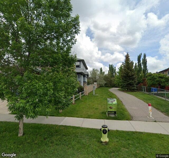 Street view of 687 Chaparral Drive SE, Calgary