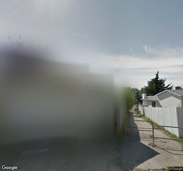 Street view of 115 Deer Ridge Place SE, Calgary