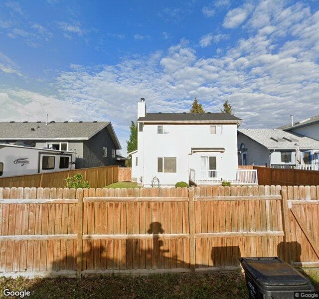 Street view of 1527 Sunvista Way SE, Calgary