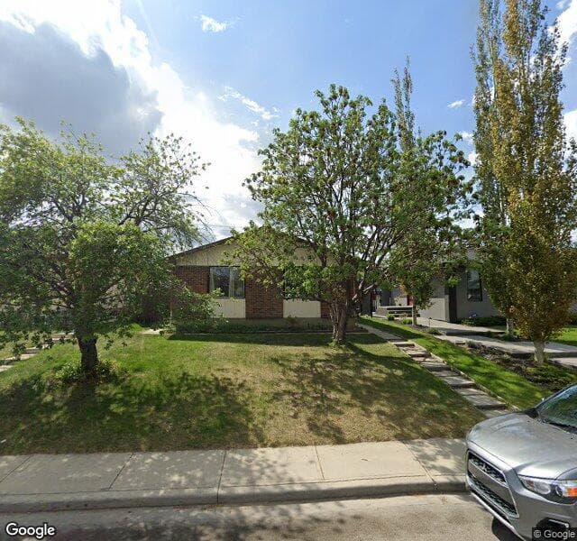 Street view of 8027 Huntington Road NE, Calgary