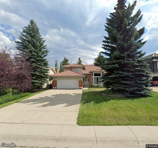 Street view of 604 Coach Grove Road SW, Calgary