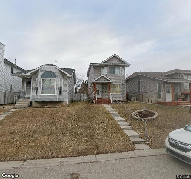 Street view of 35 Rivercrest Circle SE, Calgary