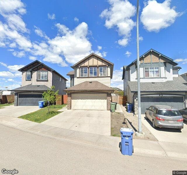 Street view of 115 New Brighton Close SE, Calgary