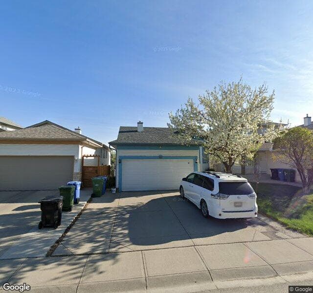 Street view of 48 Hidden Spring Close NW, Calgary