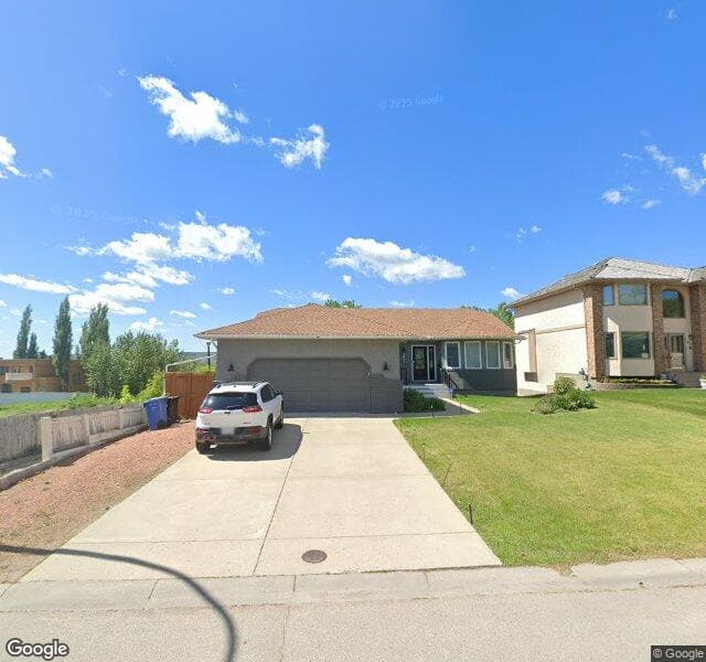 Street view of 5611 Buckboard Road NW, Calgary