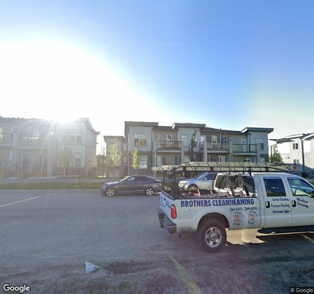 Street view of 64 Spring Creek Common SW, Calgary