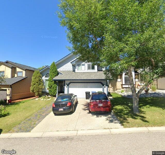 Street view of 96 Strathaven Circle SW, Calgary