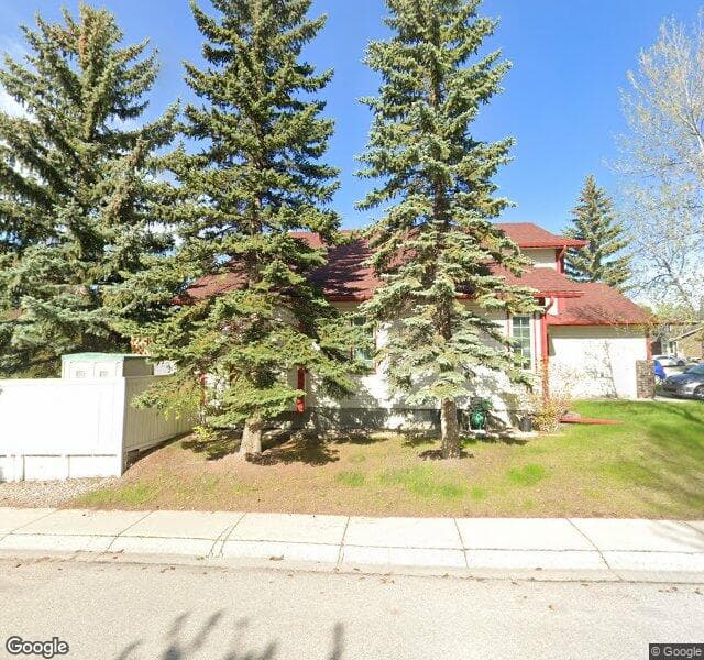 Street view of 62 Sunrise Circle SE, Calgary