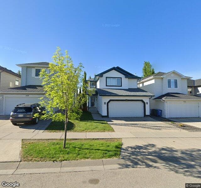Street view of 1054 Tuscany Drive NW, Calgary
