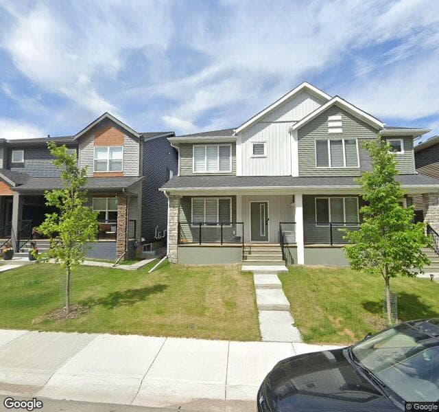 Street view of 303 Wolf Creek Way SE, Calgary