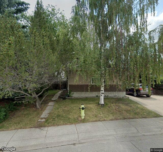 Street view of 1520 Lake Twintree Way SE, Calgary