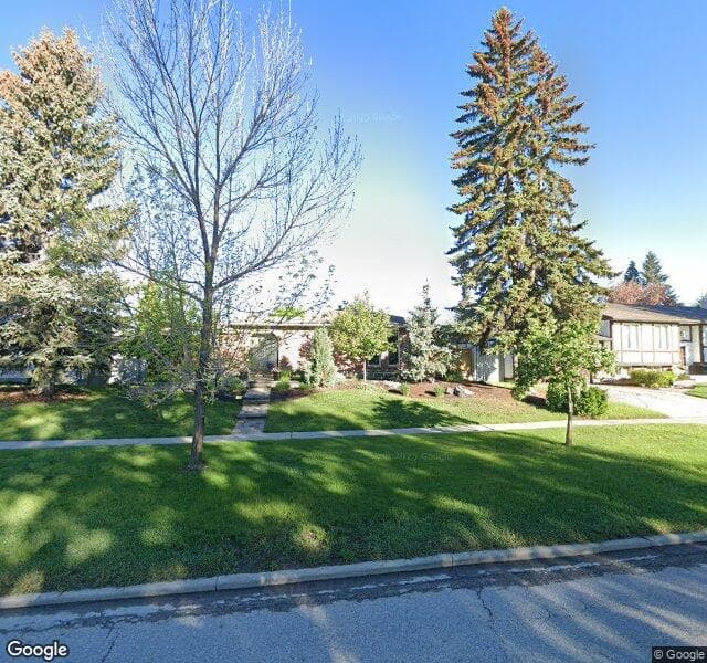 Street view of 1079 Acadia Drive SE, Calgary