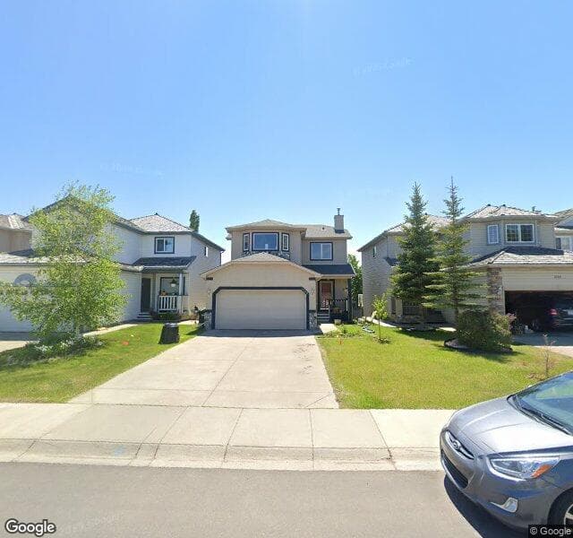 Street view of 1148 Harvest Hills Drive NE, Calgary