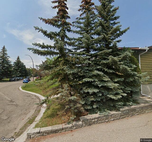Street view of 44 Woodglen Mews SW, Calgary