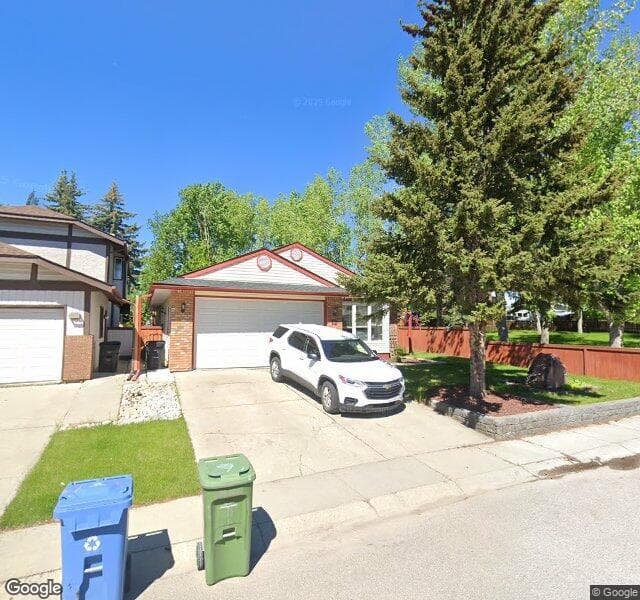 Street view of 72 Woodfield Crescent SW, Calgary
