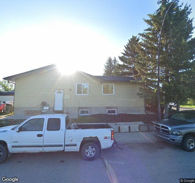 Street view of 53 Queen Isabella Close SE, Calgary