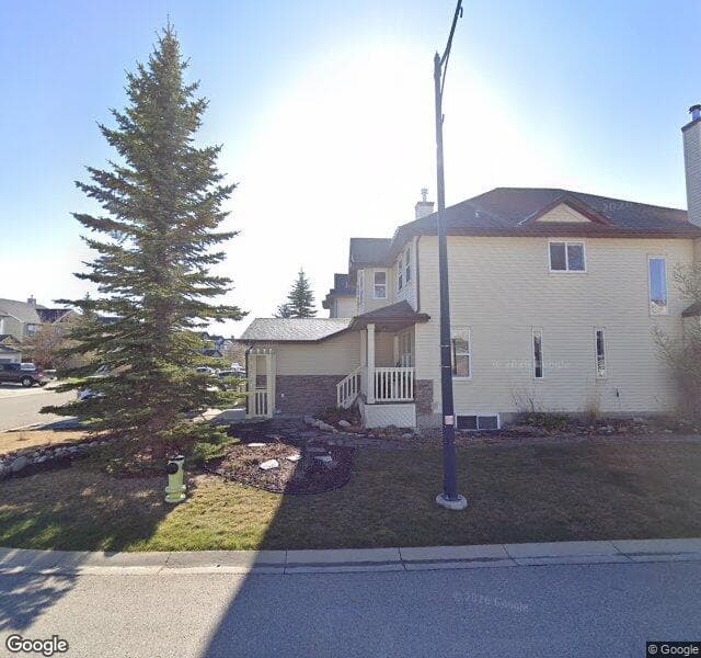 Street view of 93 Cougarstone Terrace SW, Calgary