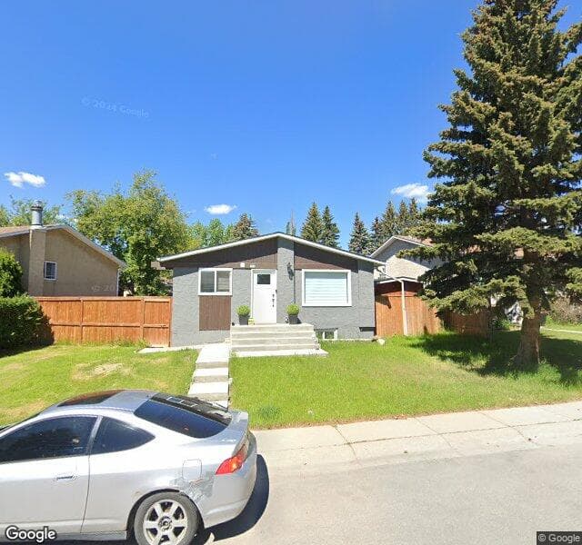 Street view of 216 Rundlecairn Road NE, Calgary