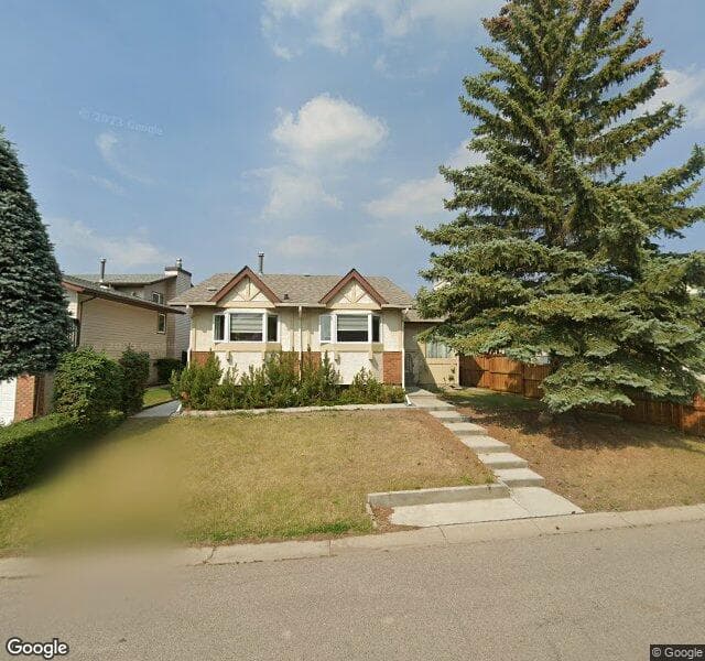 Street view of 79 Woodfield Drive SW, Calgary