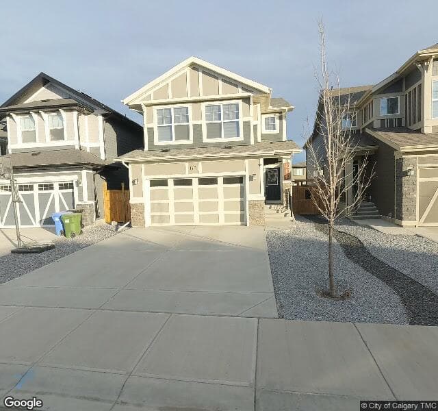 Street view of 61 Magnolia Terrace SE, Calgary